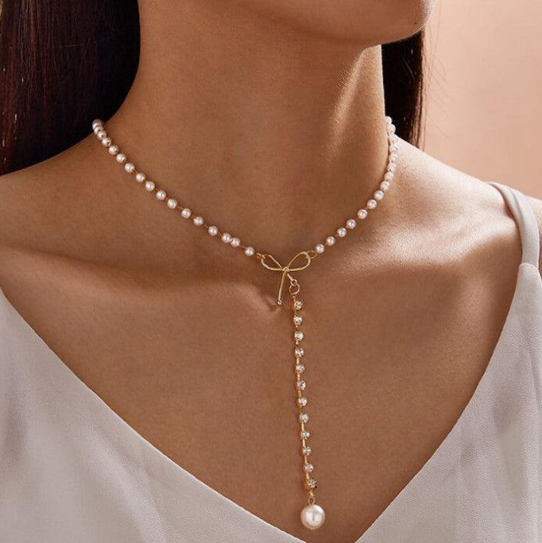 Graceful Bow Long Pearl Tassel Necklace